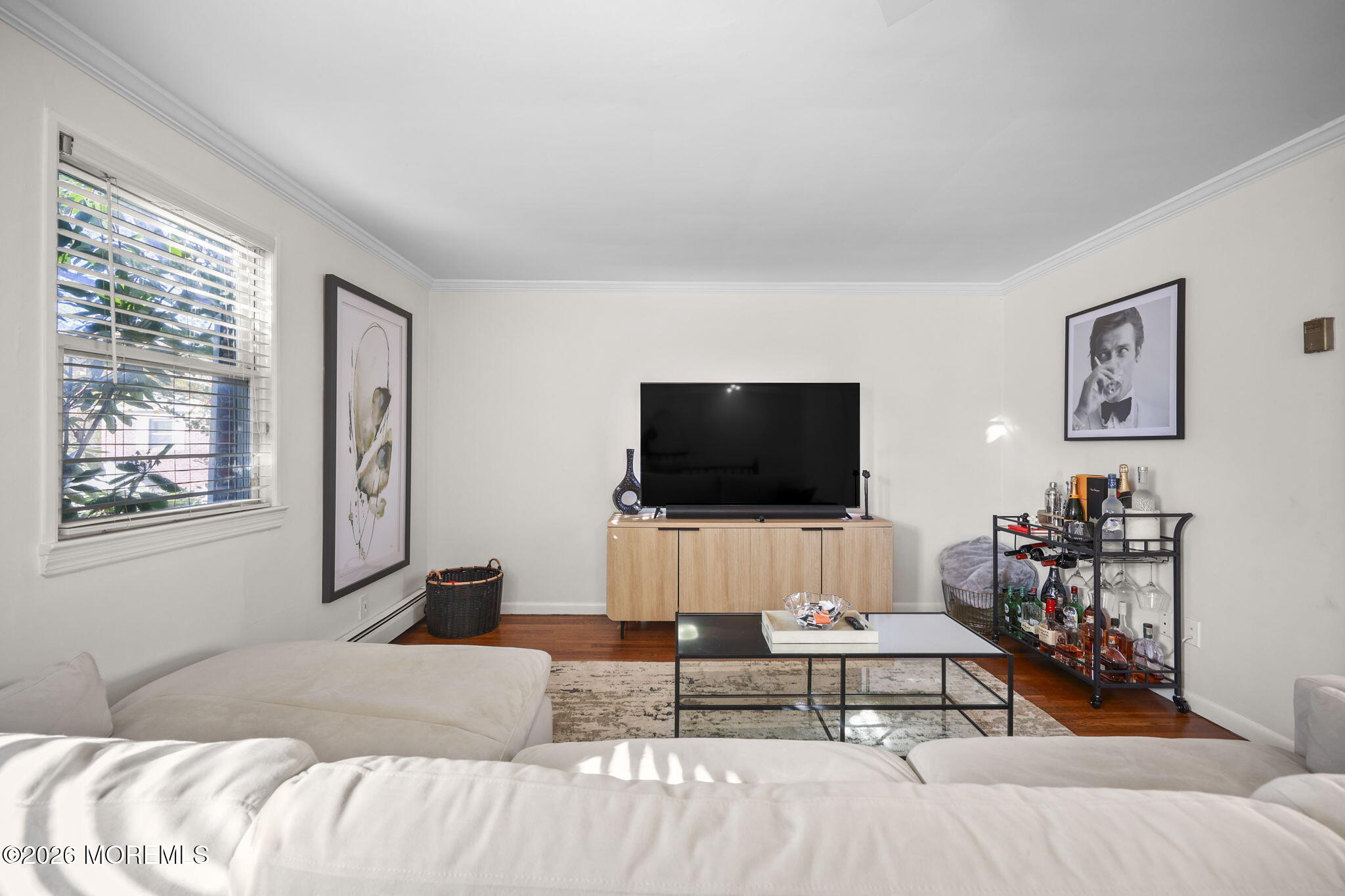 39 Manor Drive Red Bank, NJ 07701 - Photo 5 of 19 a living room with furniture and a flat screen tv