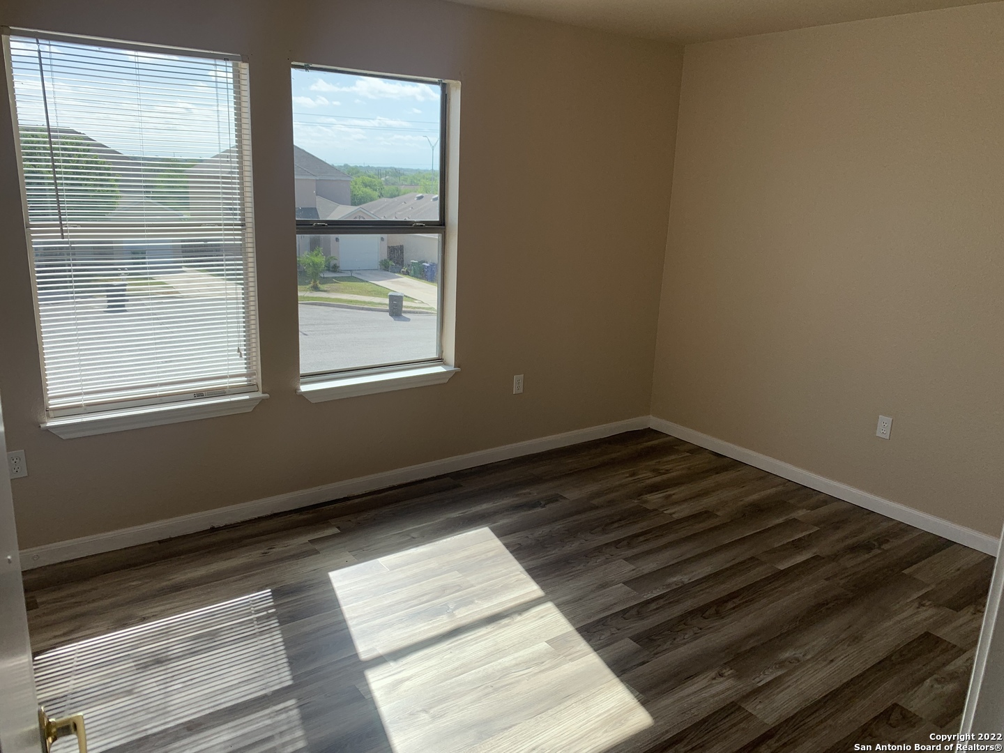 6911 Hallie Ridge San Antonio, TX 78227 - Photo 16 of 22 a view of an empty room and wooden floor