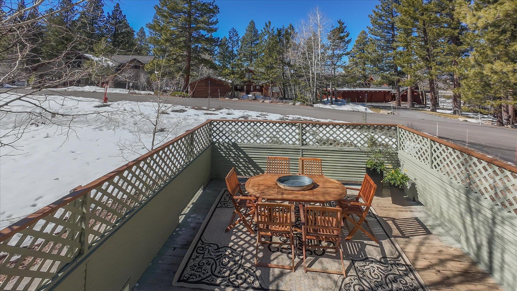 265 Basque Drive Truckee, CA 96161 - Photo 7 of 25 a view of balcony with wooden floor outdoor seating and yard in the back