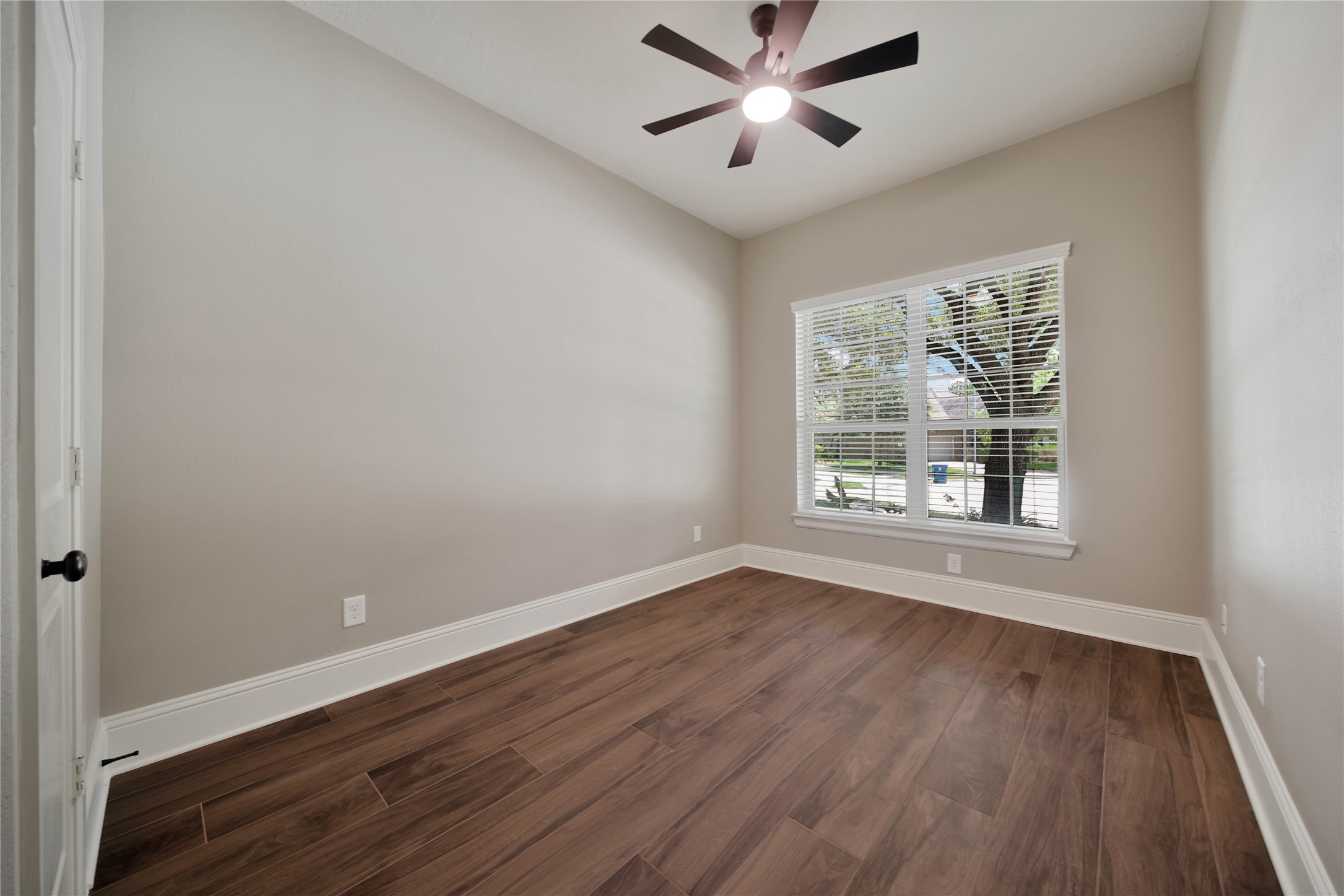 1215 Jake Springs Court Spring, TX 77386 - Photo 25 of 49 The secondary bedrooms are spacious and bright with generous closet space.