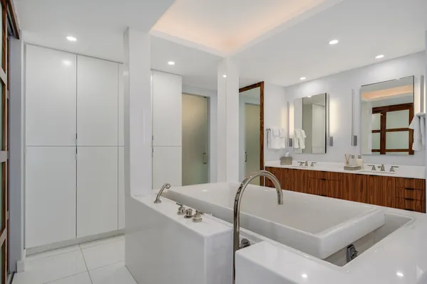 a bathroom with a bathtub and a sink