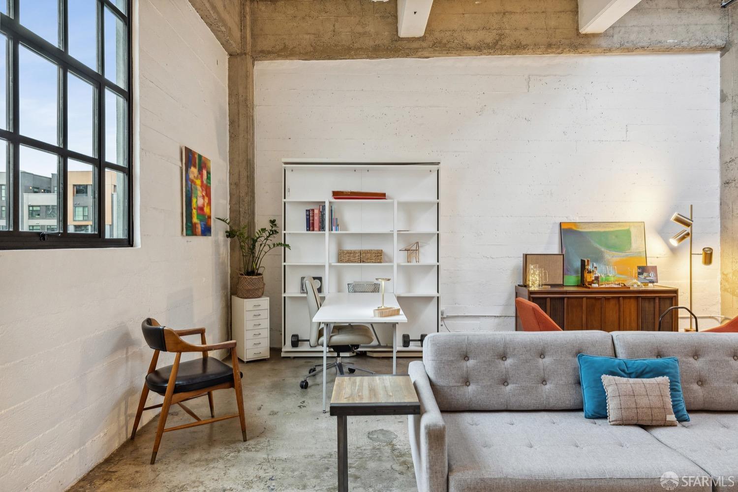 247 4th Street, Unit 406 Oakland, CA 94607 - Photo 36 of 46 a living room with furniture