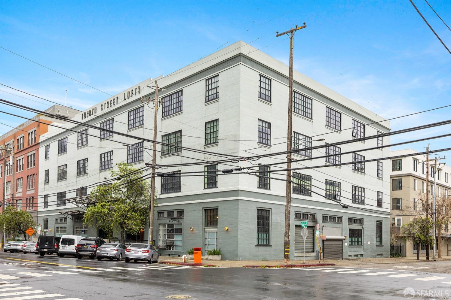247 4th Street, Unit 406 Oakland, CA 94607 - Photo 46 of 46 a front view of a building with street view