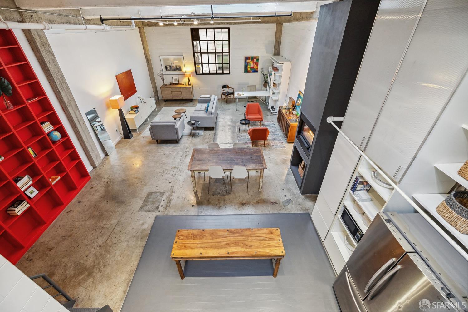 247 4th Street, Unit 406 Oakland, CA 94607 - Photo 9 of 46 a view of living room with furniture and a flat screen tv