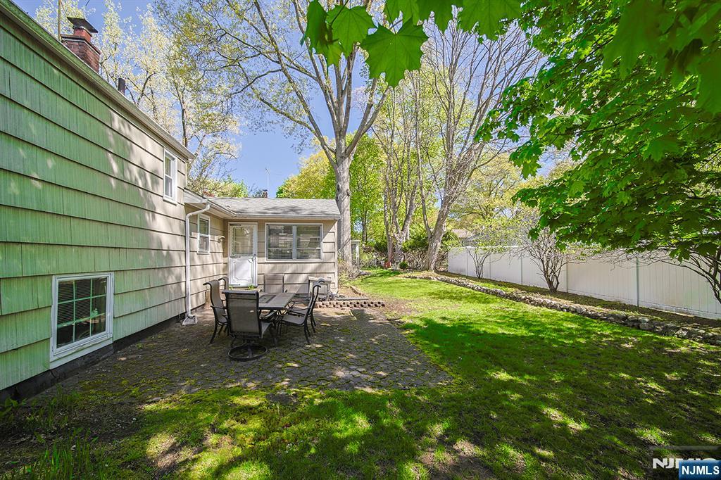 181 Crescent Street Closter, NJ 07624 - Photo 4 of 25 a view of a house with backyard