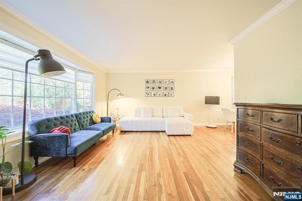 181 Crescent Street Closter, NJ 07624 - Photo 6 of 25 a living room with furniture and a large window