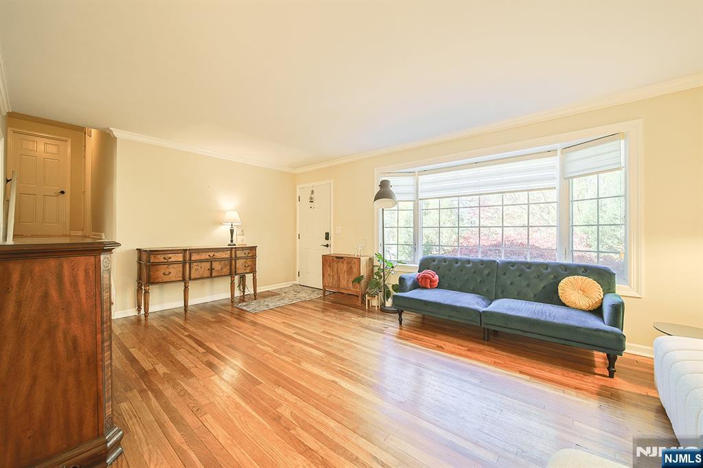 181 Crescent Street Closter, NJ 07624 - Photo 8 of 25 a living room with furniture and a window