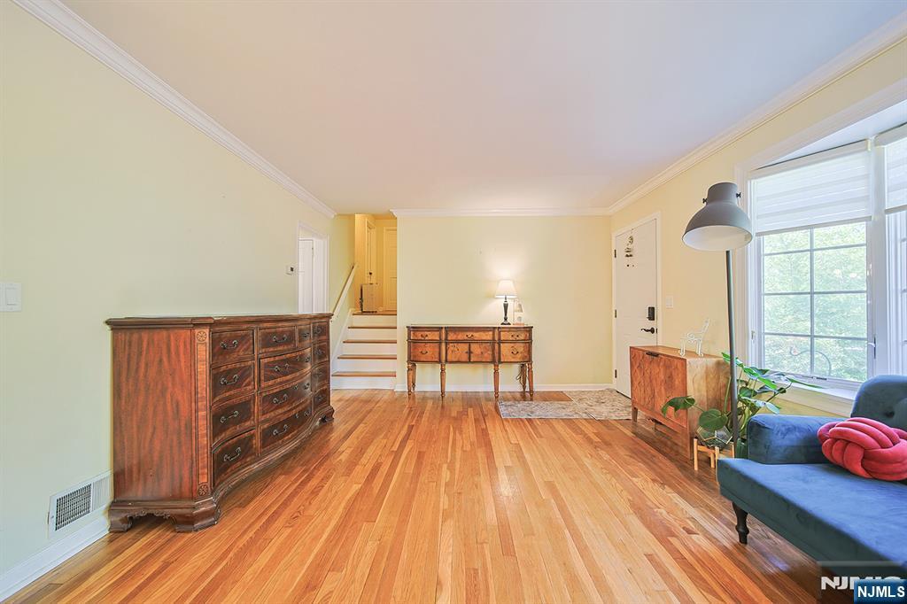 181 Crescent Street Closter, NJ 07624 - Photo 9 of 25 a living room with furniture and wooden floor