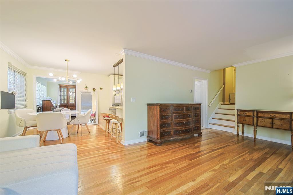181 Crescent Street Closter, NJ 07624 - Photo 10 of 25 a living room with furniture and wooden floor
