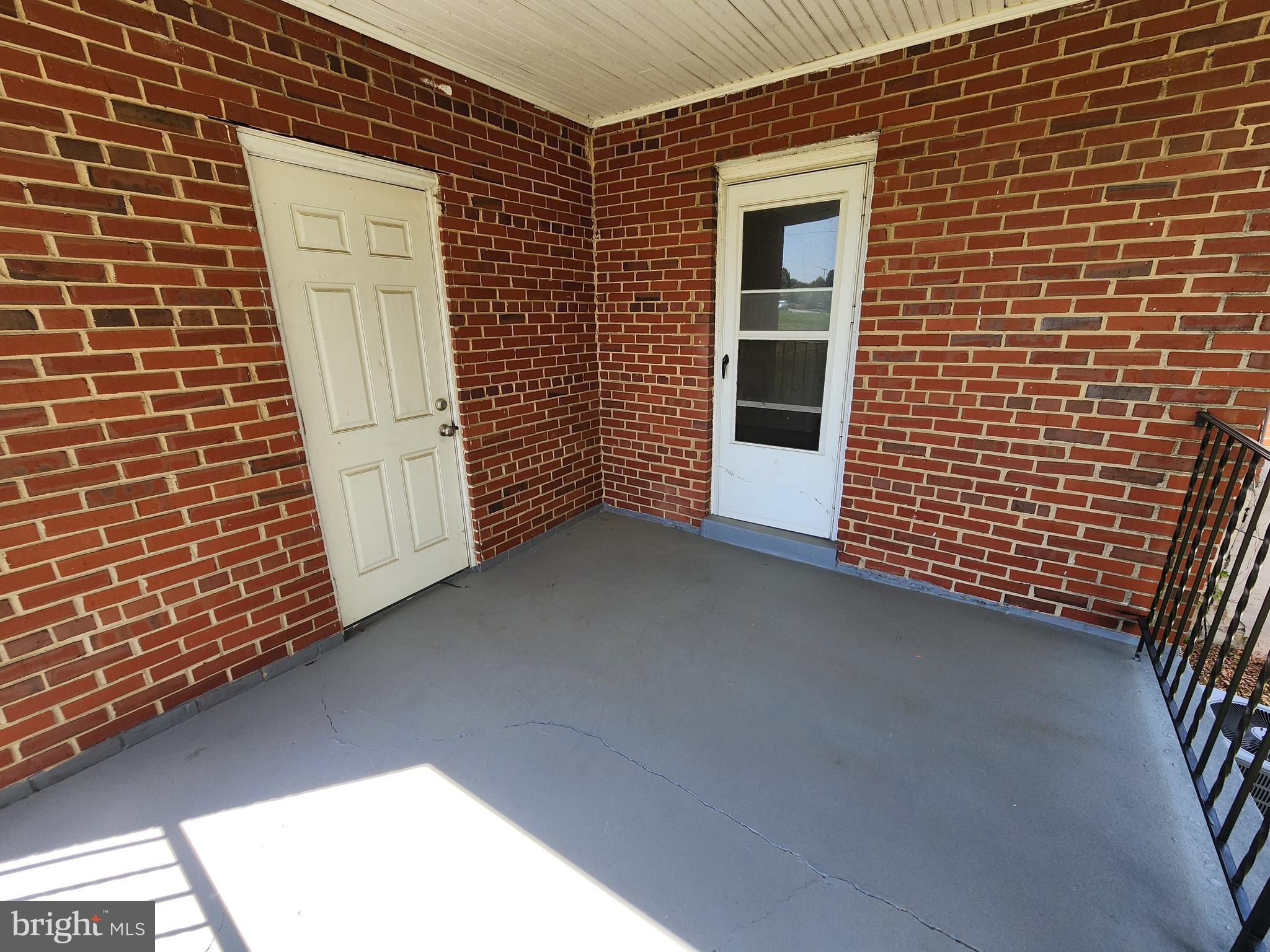 7465 Oakland Mills Road Columbia, MD 21046 - Photo 23 of 23 a view of a door of a house