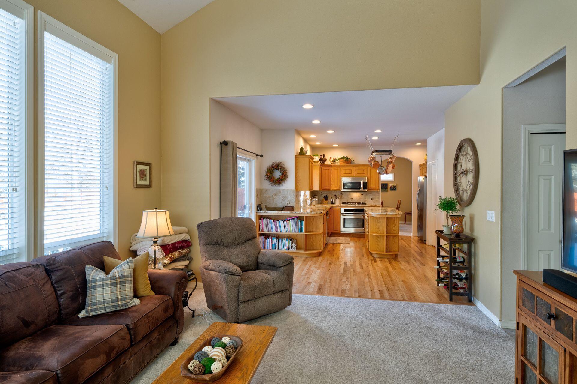 3335 Northeast Stonebrook Loop Bend, OR 97701 - Photo 17 of 29 a living room with furniture and wooden floor
