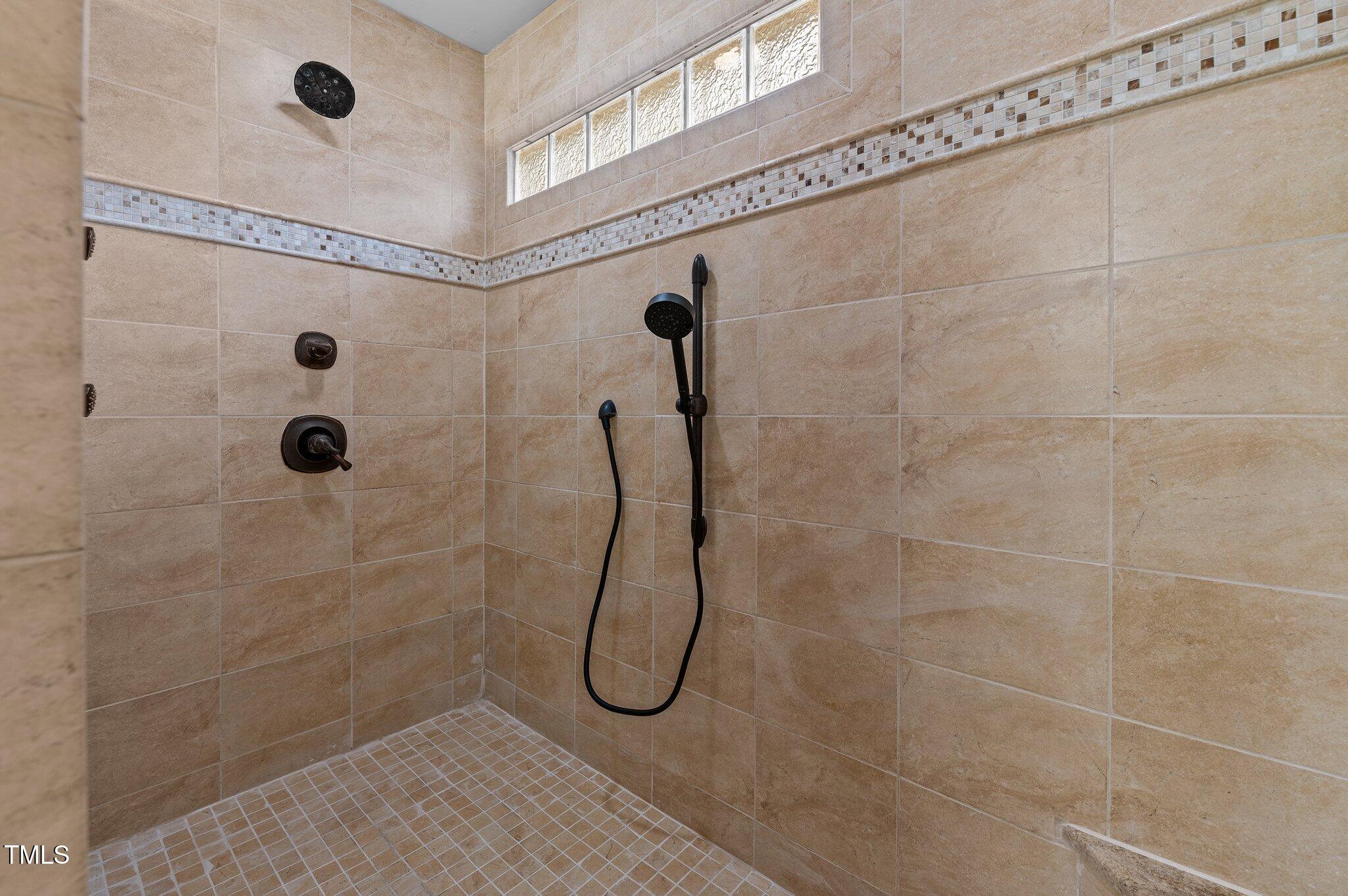 5621 Raddington Street Raleigh, NC 27613 - Photo 25 of 34 Primary Walk in Shower