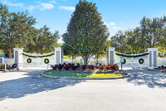 a view of sign board with garden