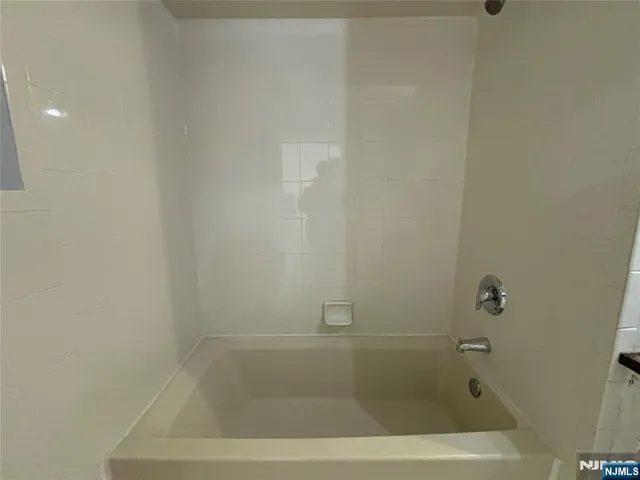 a close up of a bathtub