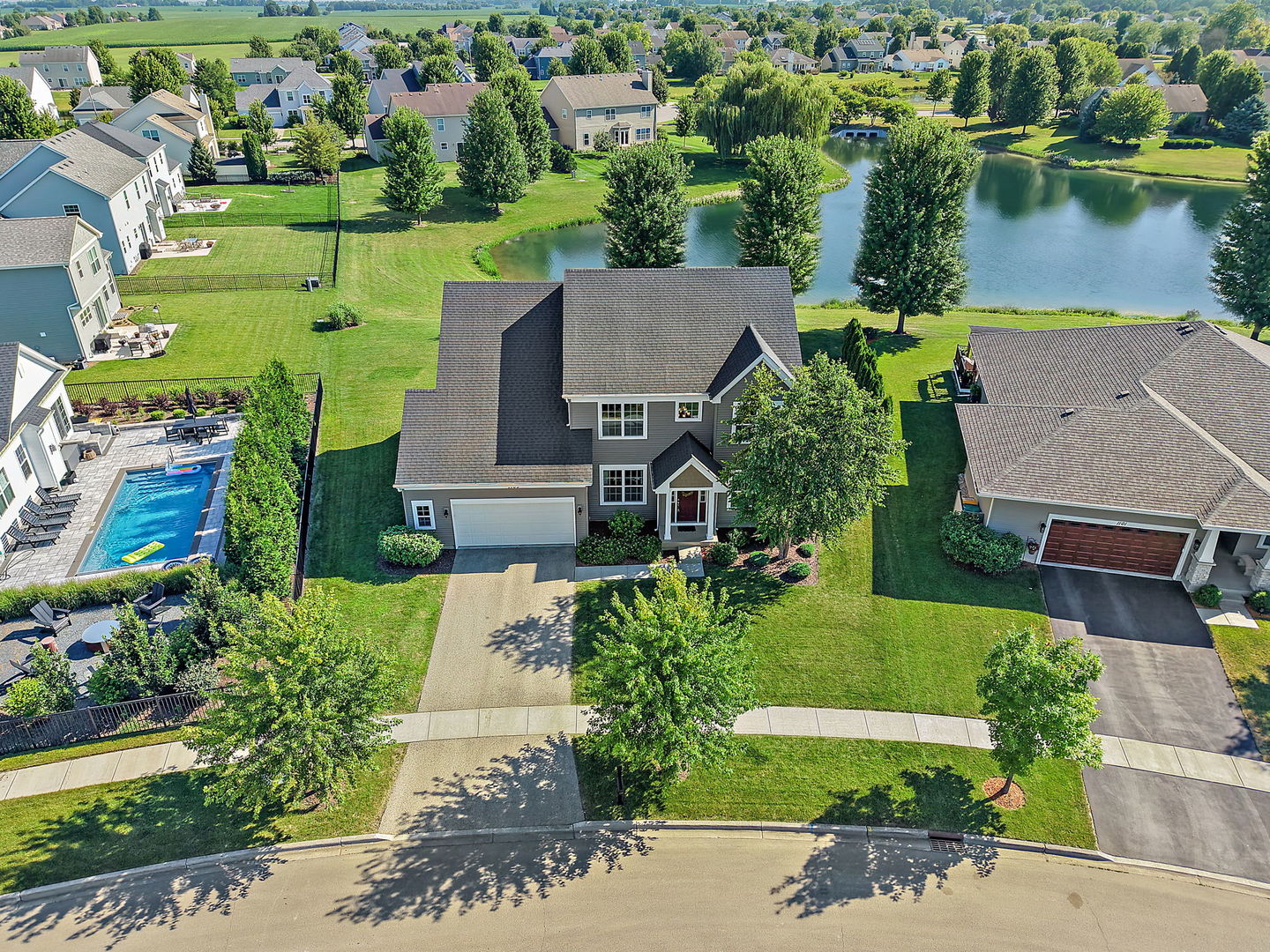 1109 Nottingham Road Sycamore, IL 60178 - Photo 36 of 44 an aerial view of a house with a garden and lake view