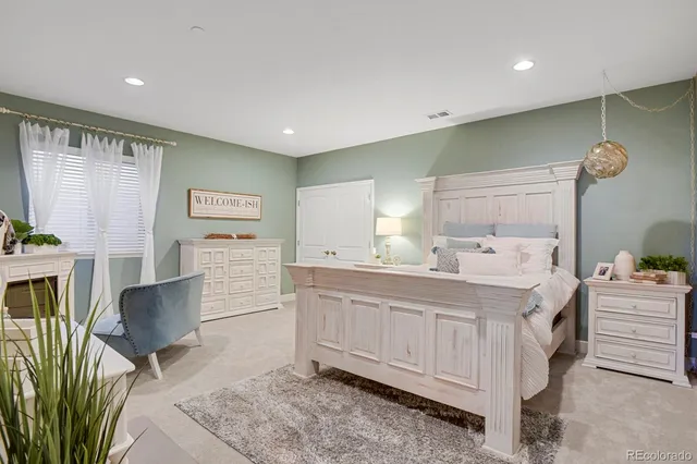 a spacious bathroom with a sink a mirror and a bathtub