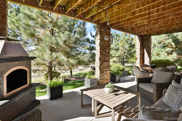 a outdoor living space with furniture and garden view