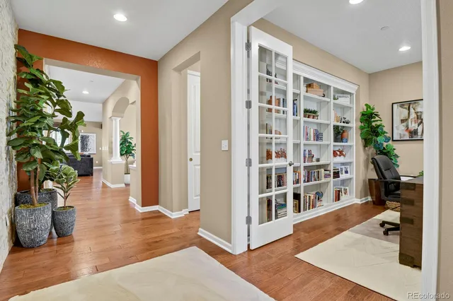 a view interior of a house with wooden floor and windows