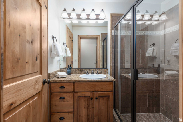 5168 Fairview Loop, Unit C604 Eden, UT 84310 - Photo 32 of 53 Full bathroom with vanity and a shower stall