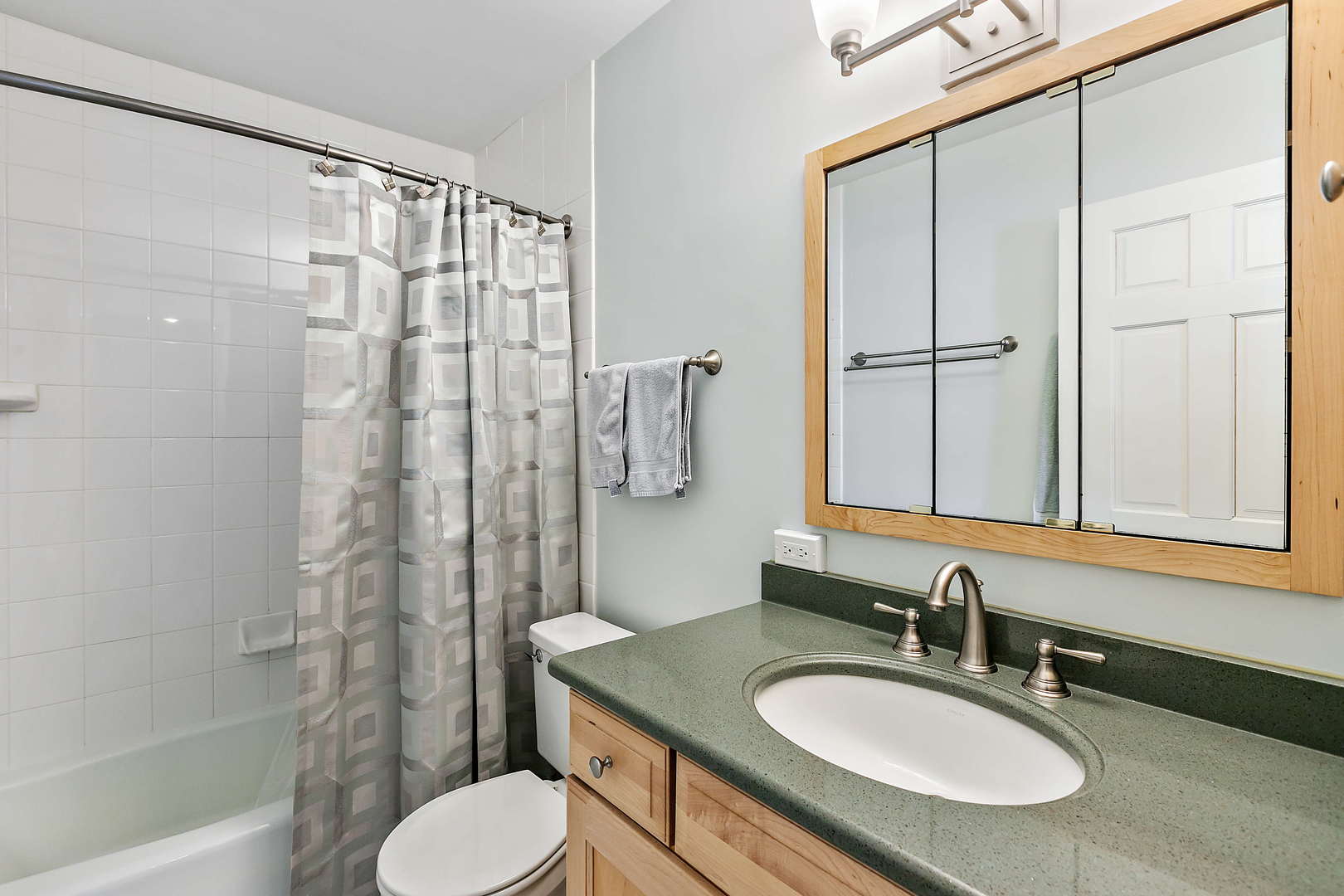 N490 Cloos Court Winfield, IL 60190 - Photo 15 of 21 a bathroom with a granite countertop sink toilet a mirror and shower