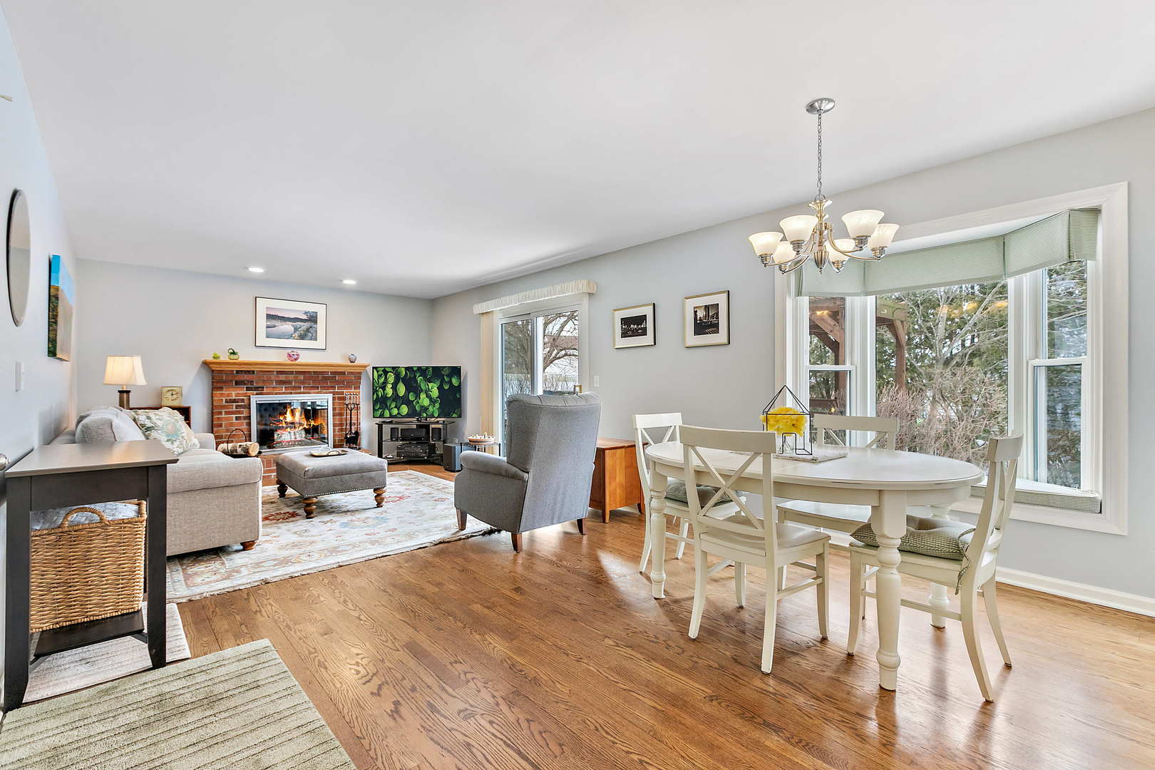 N490 Cloos Court Winfield, IL 60190 - Photo 7 of 21 a view of a dining room with furniture wooden floor and chandelier