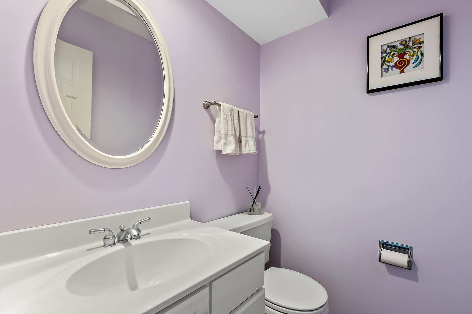 N490 Cloos Court Winfield, IL 60190 - Photo 10 of 21 a bathroom with a toilet a sink and a mirror