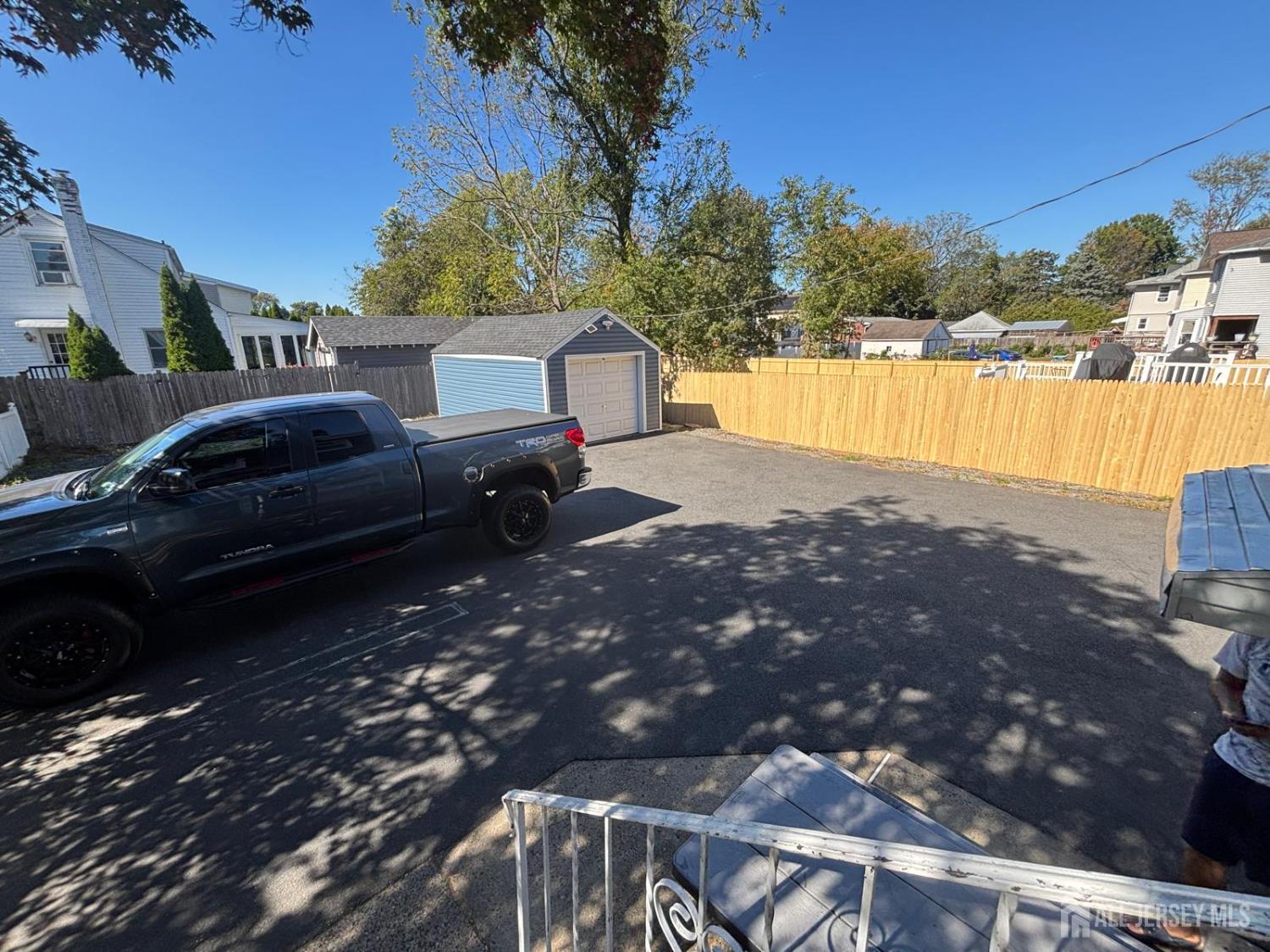220 South Washington Avenue Dunellen, NJ 08812 - Photo 12 of 21 a view of a yard in front of a house