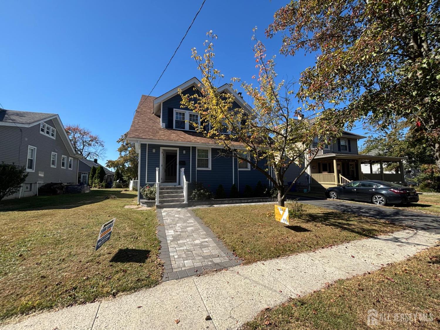 220 South Washington Avenue Dunellen, NJ 08812 - Photo 21 of 21 a front view of a house with a yard