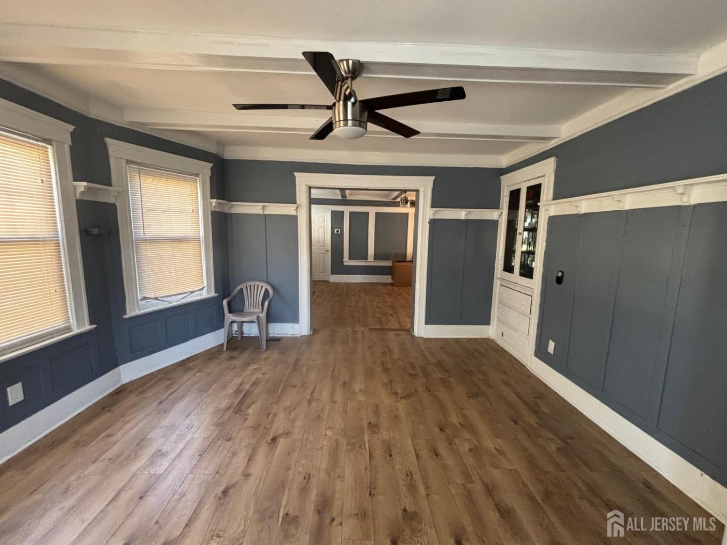 220 South Washington Avenue Dunellen, NJ 08812 - Photo 3 of 21 a furnished livingroom with a window and wooden floor
