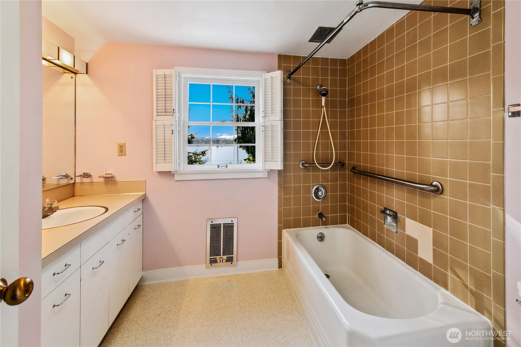 2425 Evergreen Point Road Medina, WA 98039 - Photo 23 of 37 a bathroom with a granite countertop tub sink shower and mirror