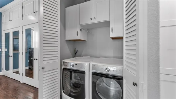 a outdoor living space with furniture and a floor to ceiling window