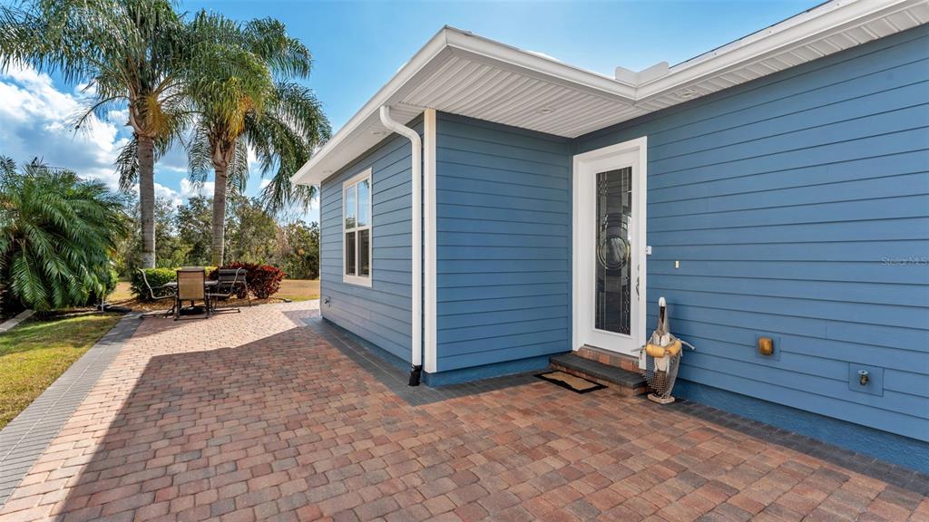 3272 Fish Hawk Drive Polk City, FL 33868 - Photo 9 of 38 a view of a house with a patio