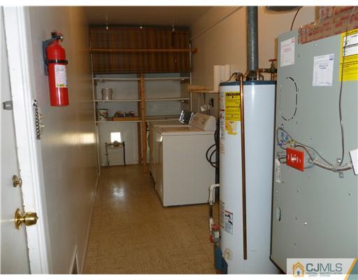 24 Summerall Road Somerset, NJ 08873 - Photo 13 of 24 a utility room with dryer and washer