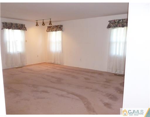 24 Summerall Road Somerset, NJ 08873 - Photo 18 of 24 a view of a window in an empty room