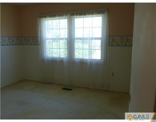 24 Summerall Road Somerset, NJ 08873 - Photo 21 of 24 an empty room with a window
