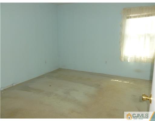 24 Summerall Road Somerset, NJ 08873 - Photo 22 of 24 a view of an empty room and window