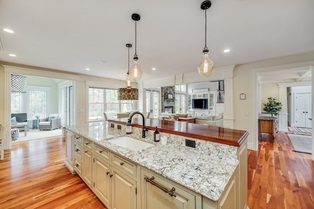 43 Boulder Ridge Plymouth, MA 02360 - Photo 14 of 42 a large kitchen with kitchen island a large counter top space a sink stainless steel appliances and cabinets