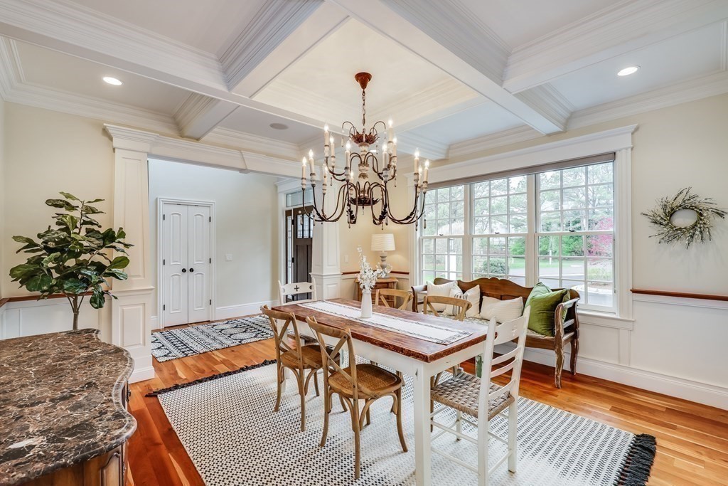 43 Boulder Ridge Plymouth, MA 02360 - Photo 17 of 42 a living room with furniture a chandelier and a rug