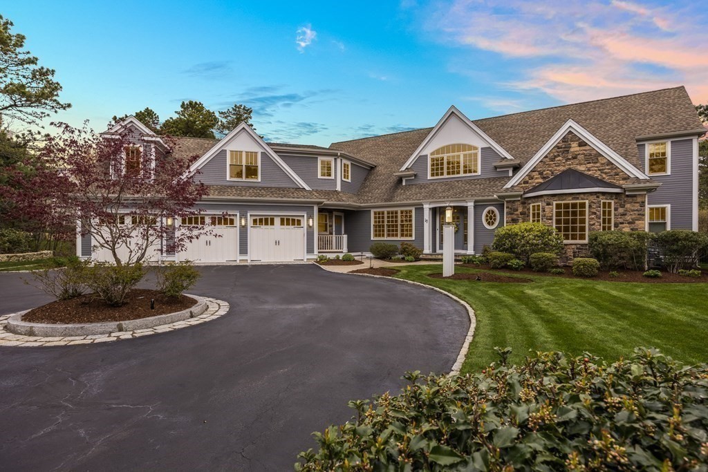 43 Boulder Ridge Plymouth, MA 02360 - Photo 3 of 42 a front view of a house with a garden and plants