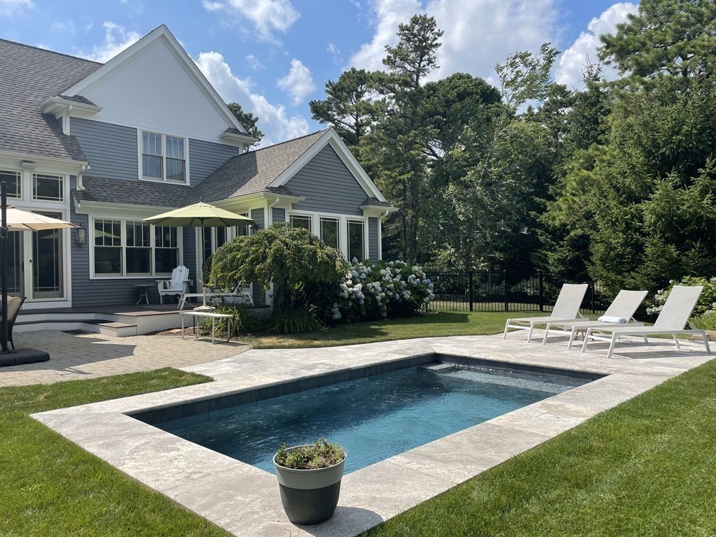 43 Boulder Ridge Plymouth, MA 02360 - Photo 34 of 42 a front view of a house with swimming pool