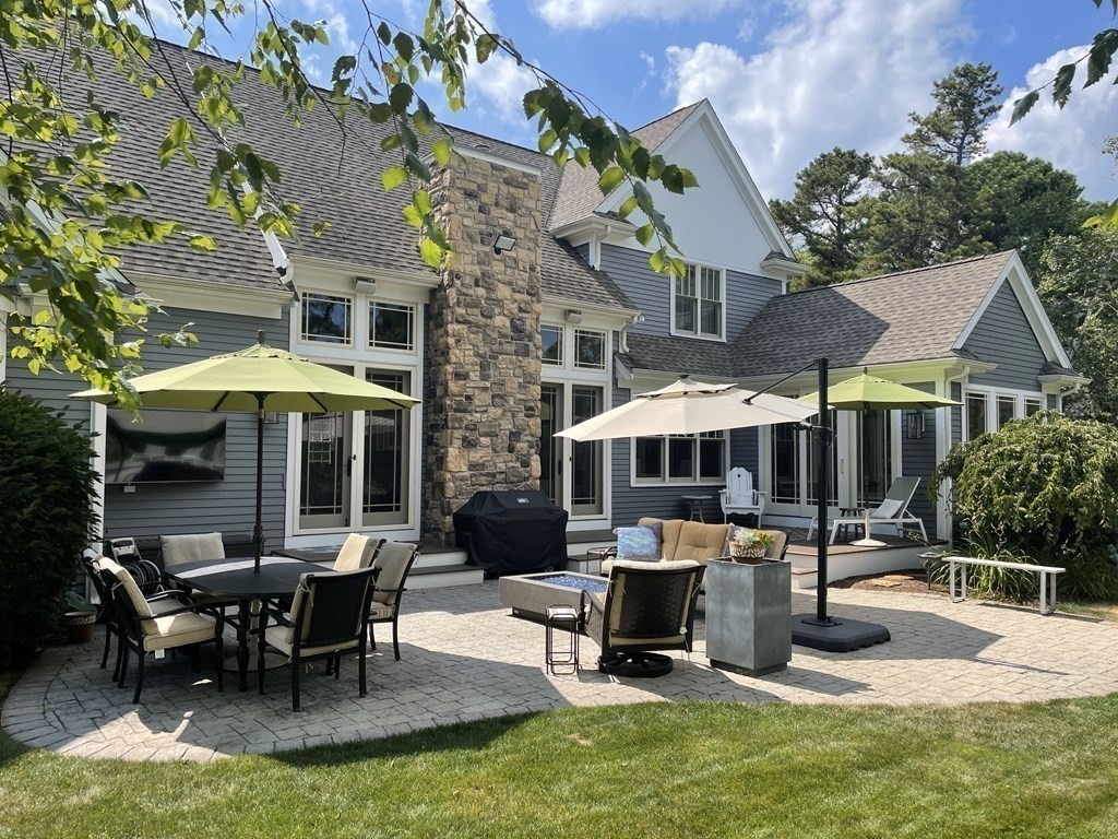 43 Boulder Ridge Plymouth, MA 02360 - Photo 37 of 42 an outdoor space with lots of table and chairs