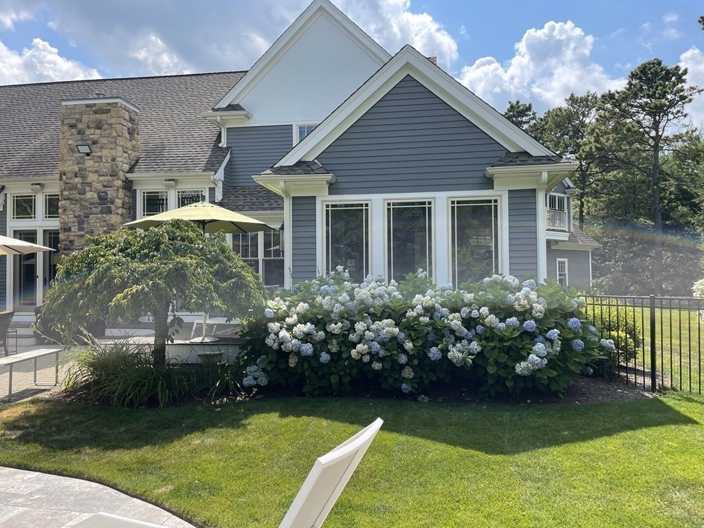 43 Boulder Ridge Plymouth, MA 02360 - Photo 39 of 42 a front view of a house with garden