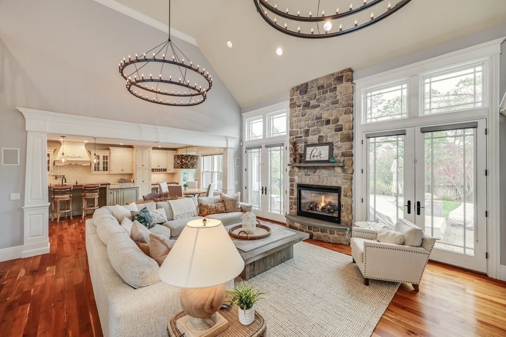 43 Boulder Ridge Plymouth, MA 02360 - Photo 5 of 42 a living room with furniture a fireplace and a large window