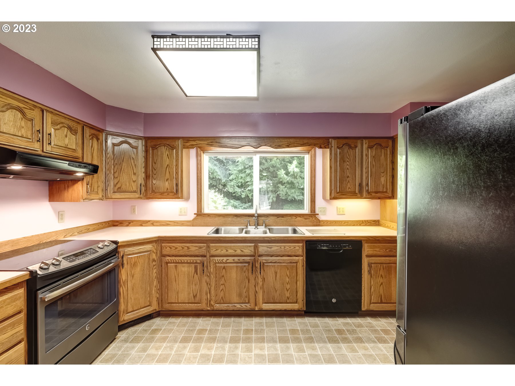 13100 Northwest Willis Road McMinnville, OR 97128 - Photo 16 of 38 a kitchen with a sink stove and cabinets