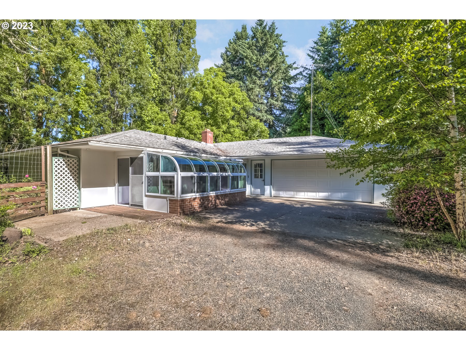 13100 Northwest Willis Road McMinnville, OR 97128 - Photo 3 of 38 a front view of a house with a garden