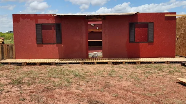 a bench sitting in the middle of a park