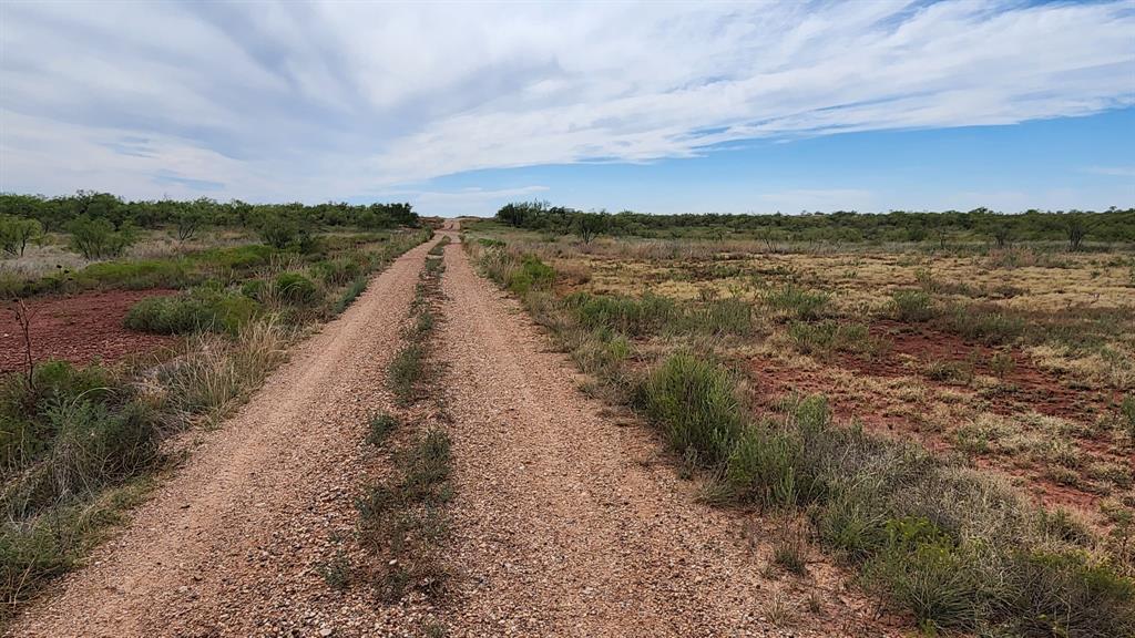 32-acres Lake Stamford 32-acres Lake Haskell, TX 79521 - Photo 20 of 26 a view of a lake with beach and city in the back