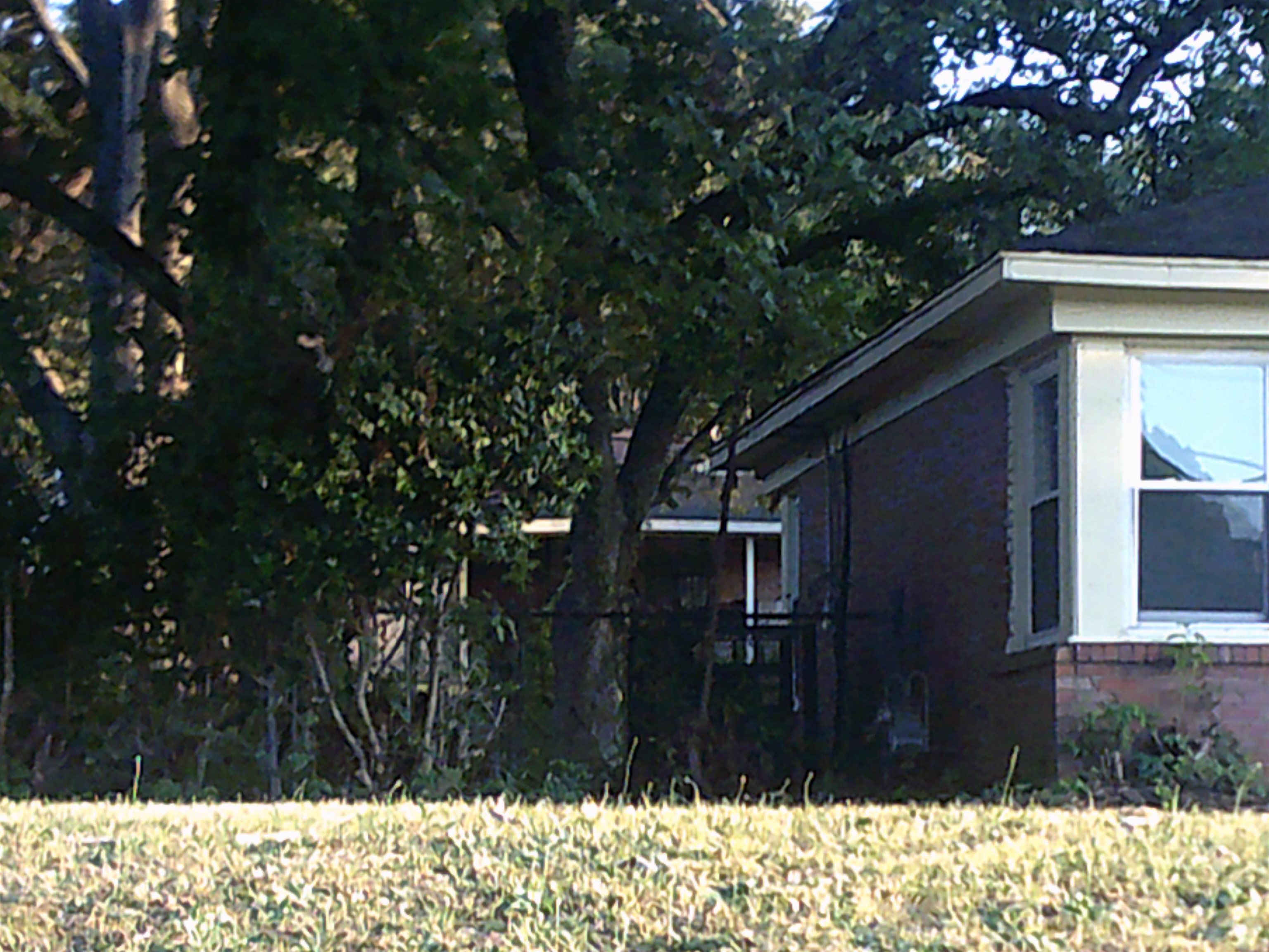 253 East Raines Road Memphis, TN 38109 - Photo 3 of 14 View of property exterior with brick siding