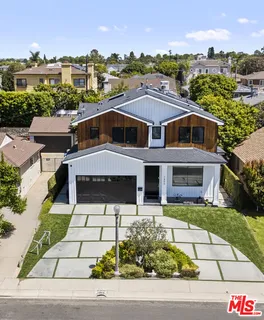 a aerial view of a house with a garden