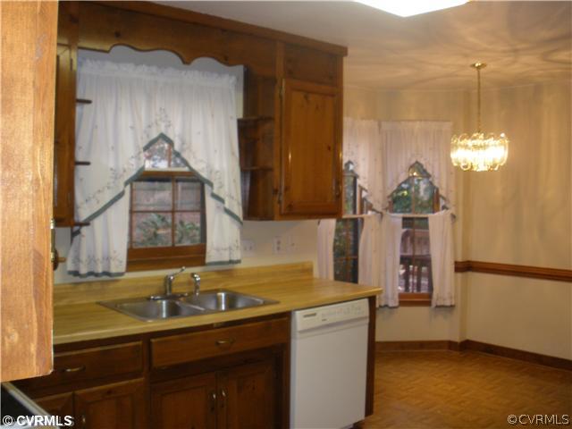 10751 Timberun Road Chesterfield, VA 23832 - Photo 4 of 10 a bathroom with a sink and a mirror